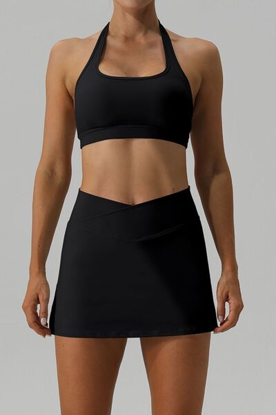 When living life on the edge, you need an outfit that stands out. The Trendsi Trends Halter Neck Tank and Slit Skirt Active Set is perfect for any active adventure. Whether you're sprinting through the city or practicing yoga, this set will keep you feeling comfortable and stylish.