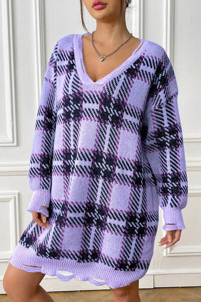 Experience ultimate comfort in the Trendsi Trends Plaid V-Neck Long Sleeve Sweater Dress, a must-have for any woman's loungewear collection. Perfect for a cozy night in or a fun sleepover with friends, this dress is a staple for both young and old. Create unforgettable moments and bond with loved ones while looking stylish in this versatile piece.