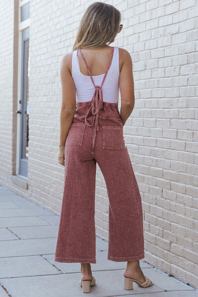 Introducing Trendsi Trends Overalls, featuring a sleek spaghetti strap design and a sophisticated square neck. Made with textured fabric for a stylish touch. Elevate your wardrobe with these chic overalls.